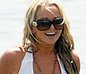 Smiling blonde Jennifer Ellison white swimsuit cameltoe