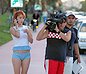 Red haired girl from camera crew has a sexy bulge