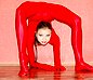 Flexy gymnast has her body and pussy squeezed by latex